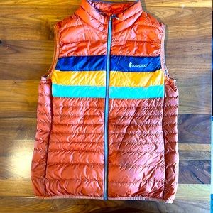 Cotopaxi Fuego Down Vest— burnt orange with vintage inspired stripes